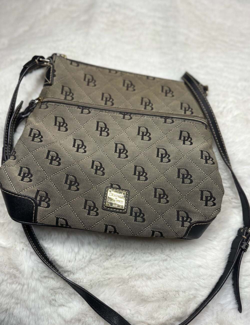 Chic Dooney & Bourke signature monogram crossbody bag.